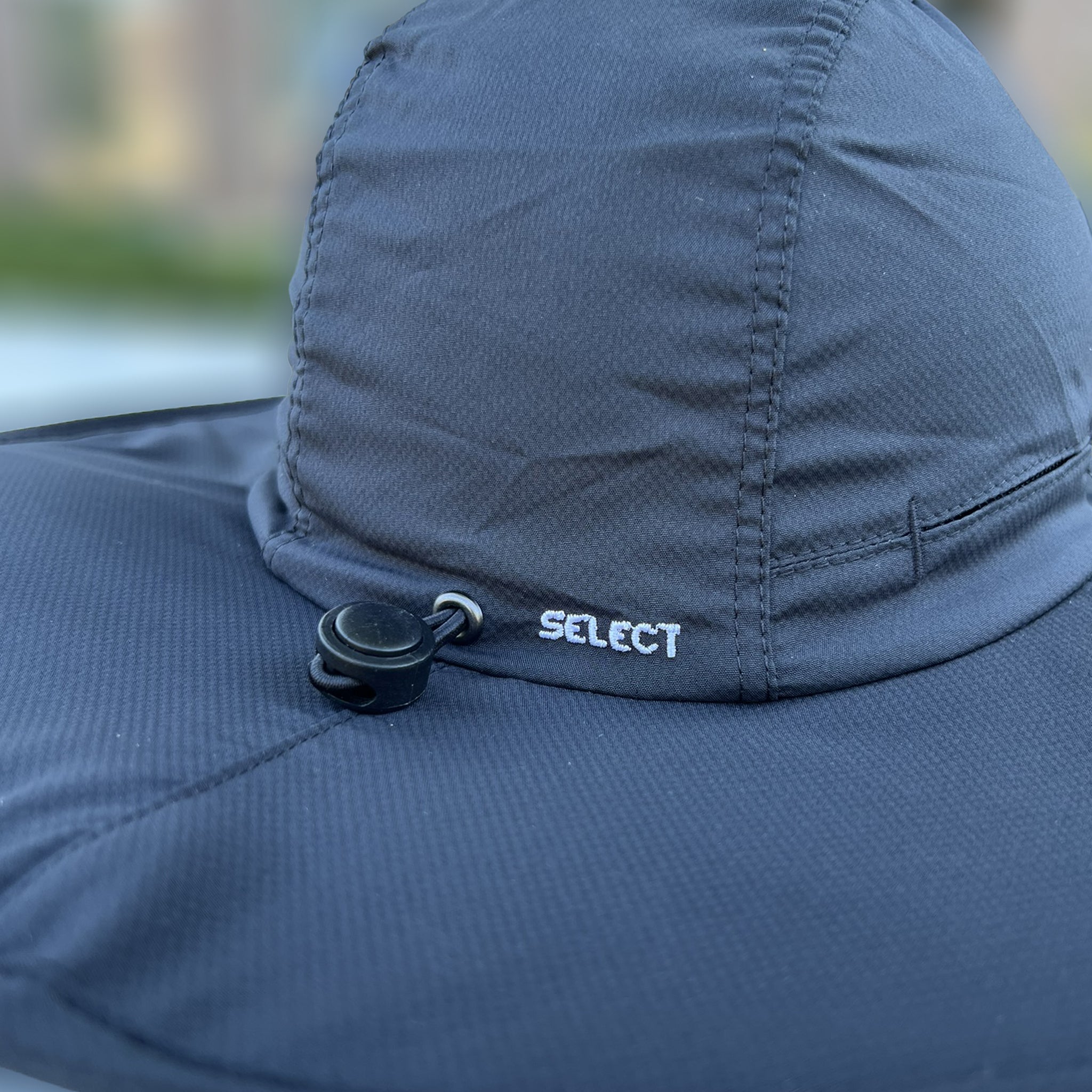Black bucket hat with a 'Select' logo patch on the front #color_black