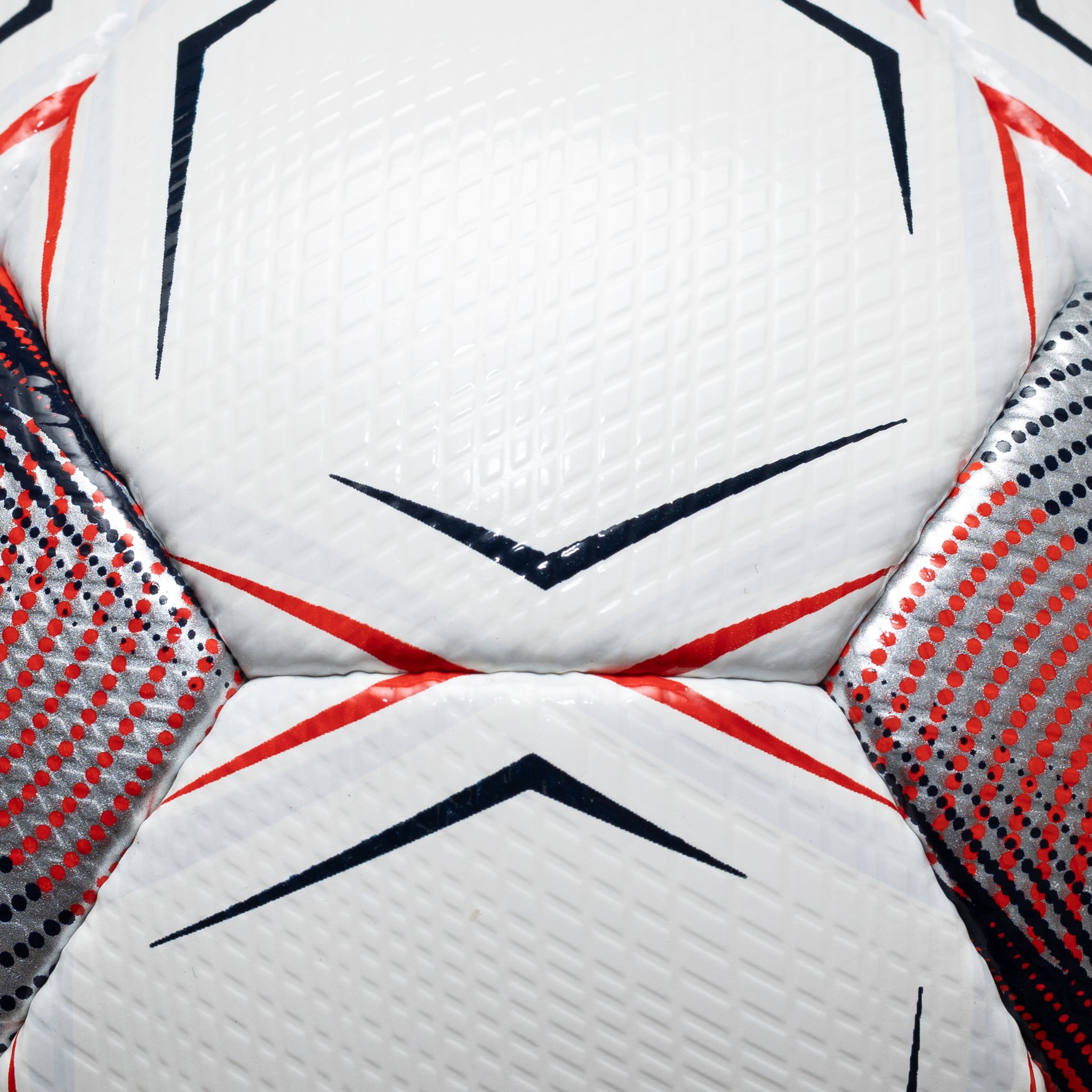 Closeup of NPSL WPSL Super v26 soccer ball in white with navy and red details