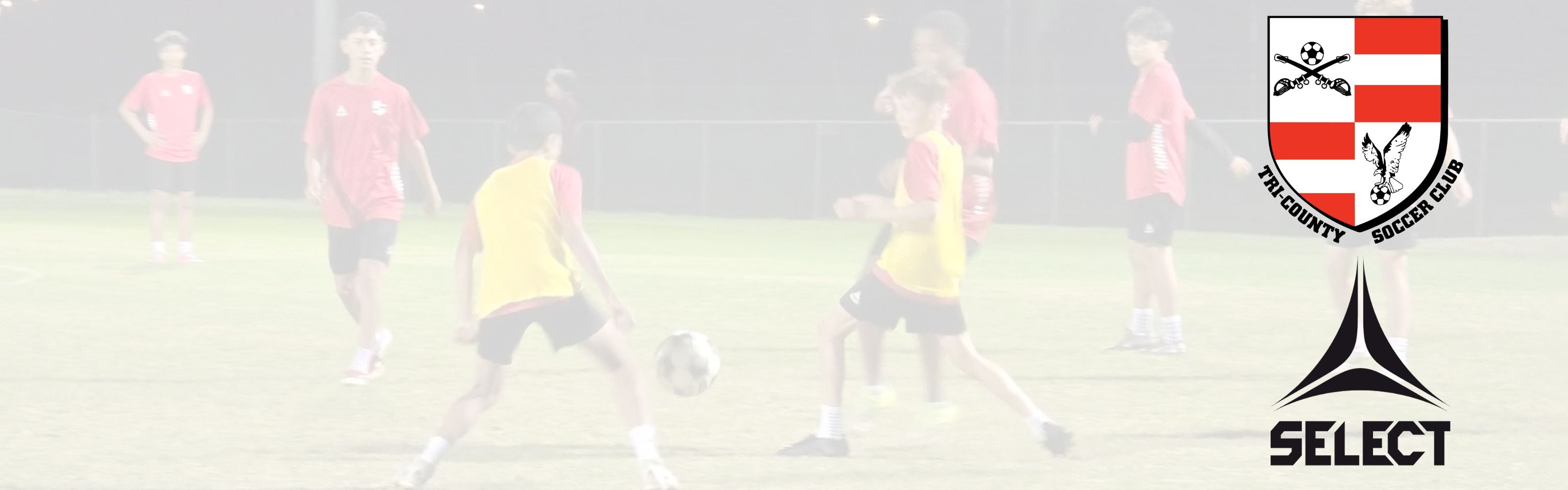 Soccer players wearing Select uniforms with logos for Tri-County Soccer Club and Select