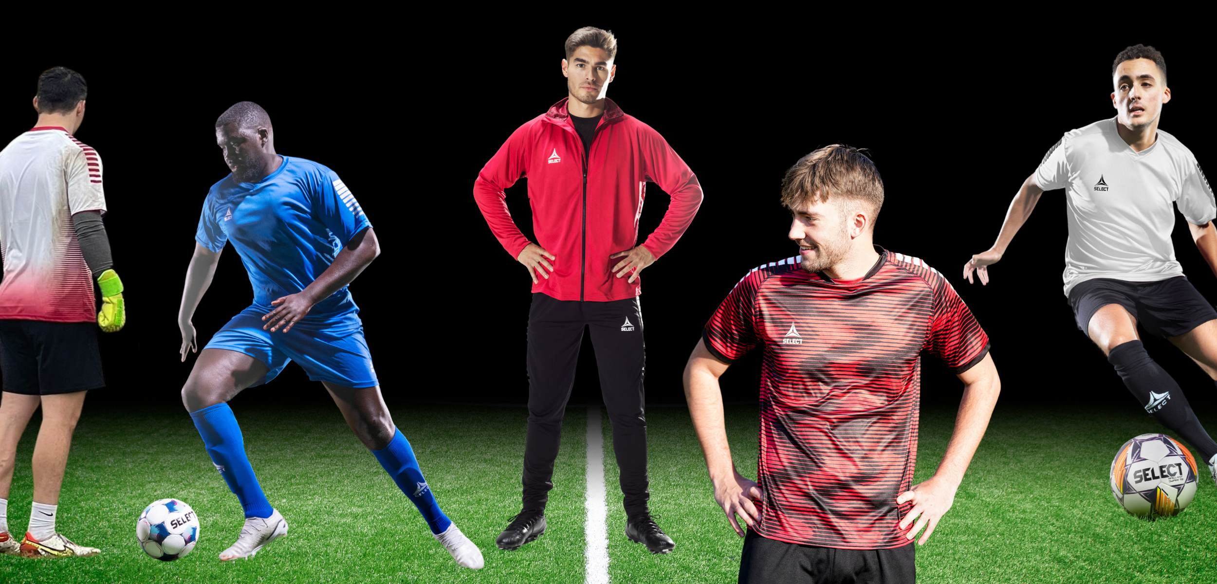 Several soccer players on a turf field with a black background in various soccer uniforms 